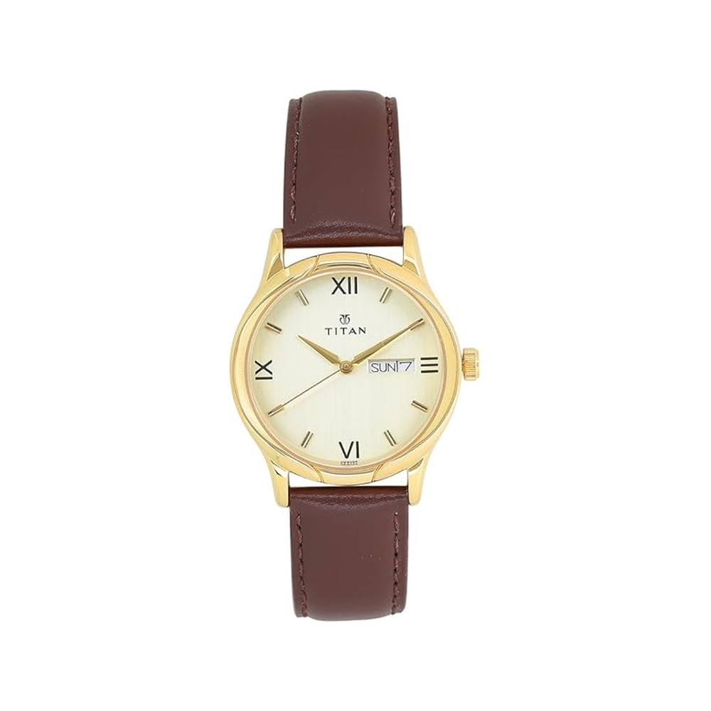 Titan NT1580YL05 Karishma men’s analogue watch with champagne dial, day date display and leather 